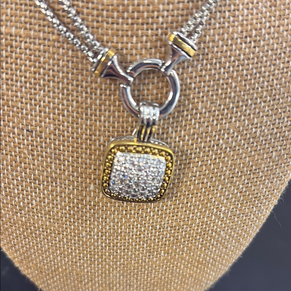 Elegant Gold and Silver Pendant Necklace
